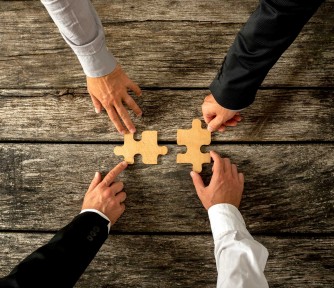Negotiating a Nonprofit Merger: 10 Key Items for Your Agenda - Featured Photo